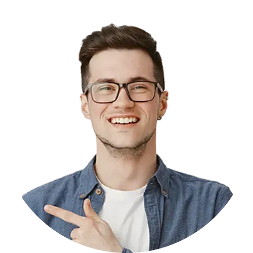 Smiling man with brown hair and glasses pointing to the side.