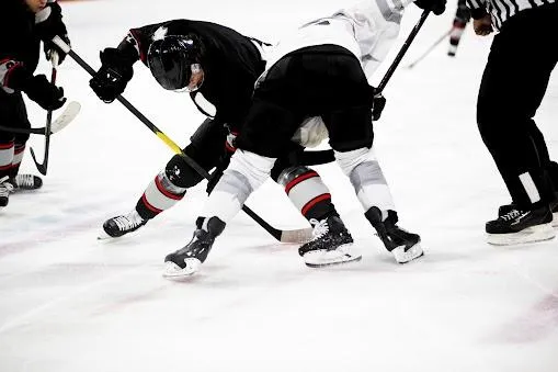 Two Players taking a faceoff