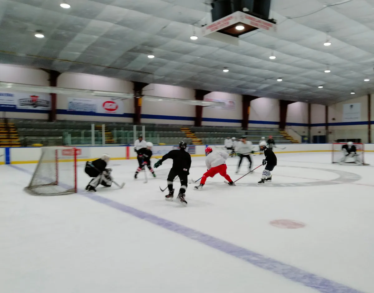 Hockey players playing on ice game