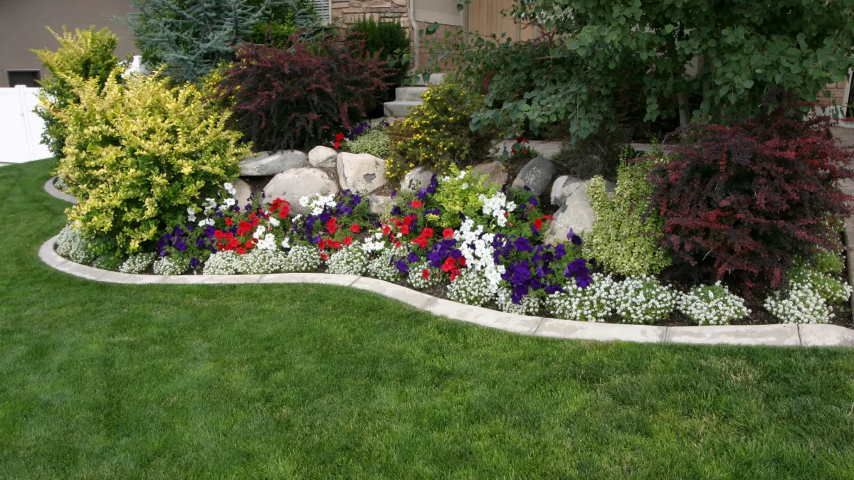 gorgeous landscaping & flower bed