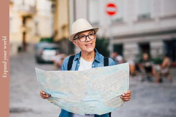 Woman in her 60s visiting a new location, showing how staying engaged supports midlife health