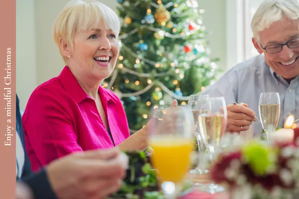 Midlife adults enjoying a festive Christmas meal together without stress or overindulgence