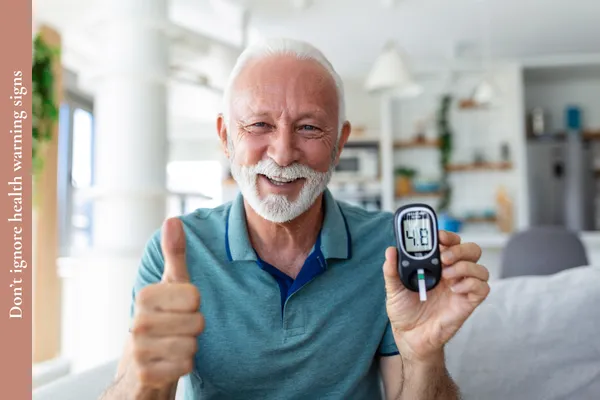 Man in his 50s or 60s monitoring blood glucose as part of his approach to healthy ageing