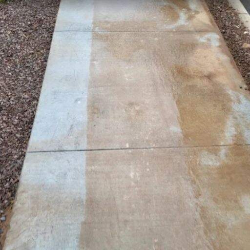 Oil stain removal from concrete using pressure washing