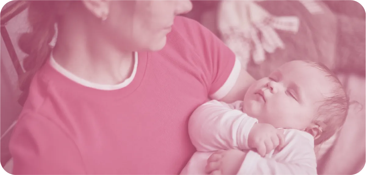 Postpartum doula providing emotional and physical support to a new mum