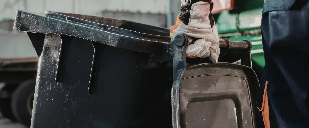 Public recycling, trash and organic waste bins for sustainable waste management.