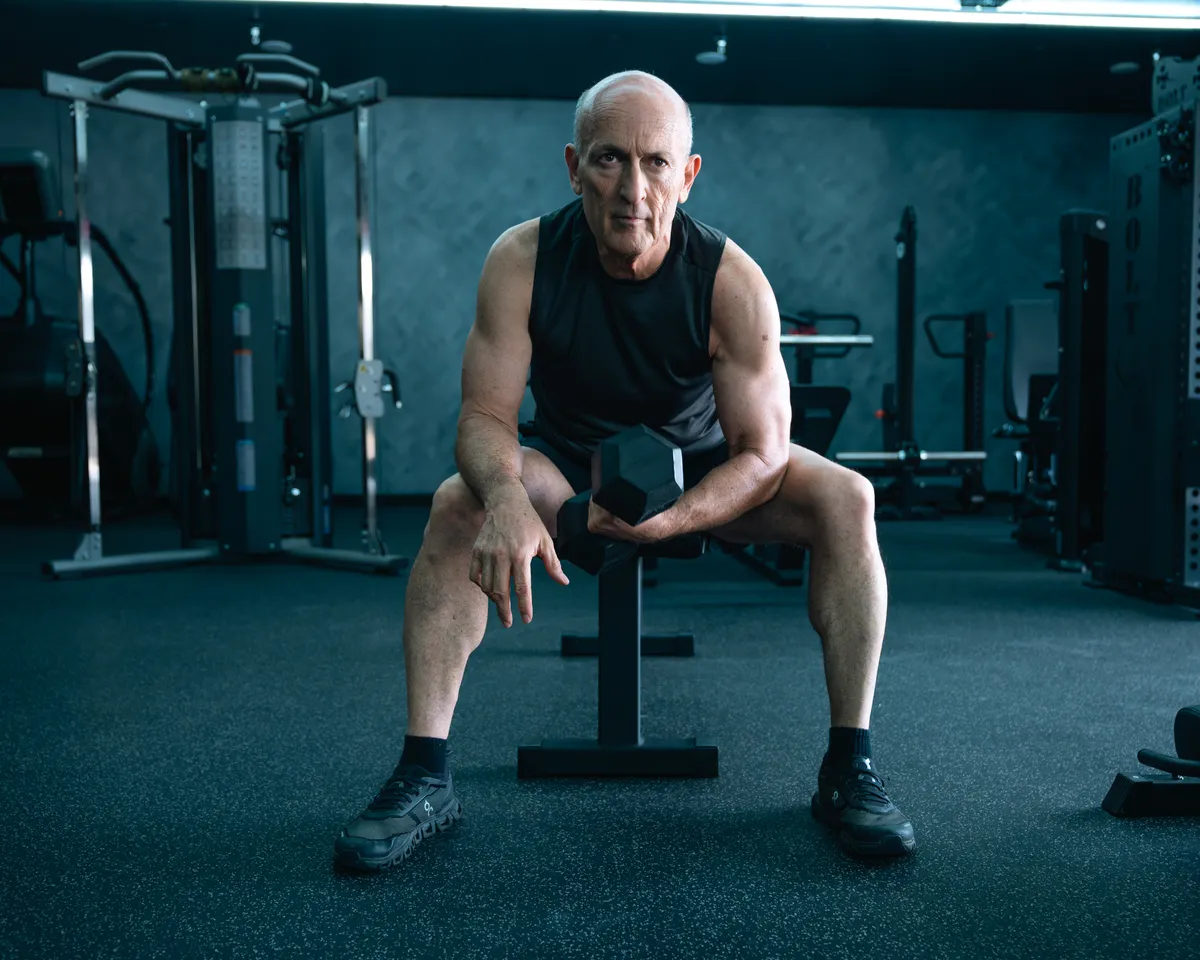 I AM ambassador seated in the gym after training