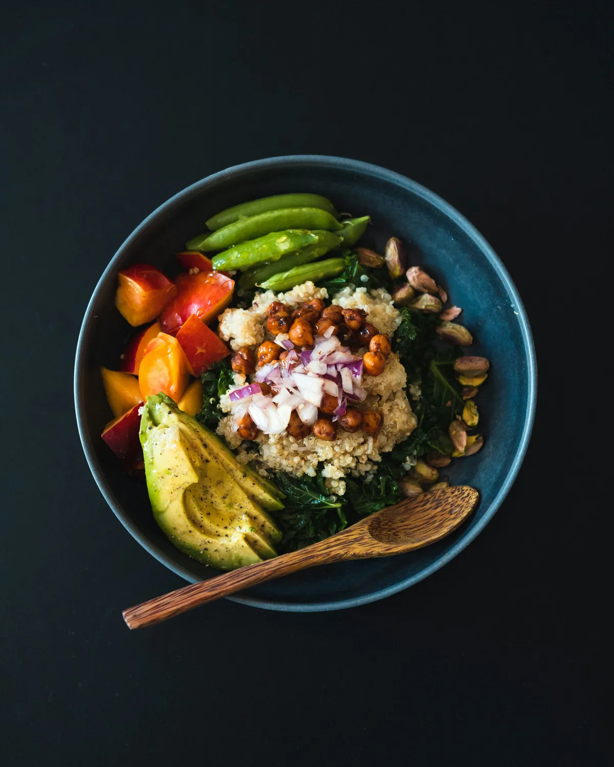 Colorful grain and vegetable bowl with avocado
