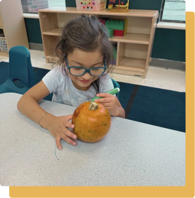child painting in childcare