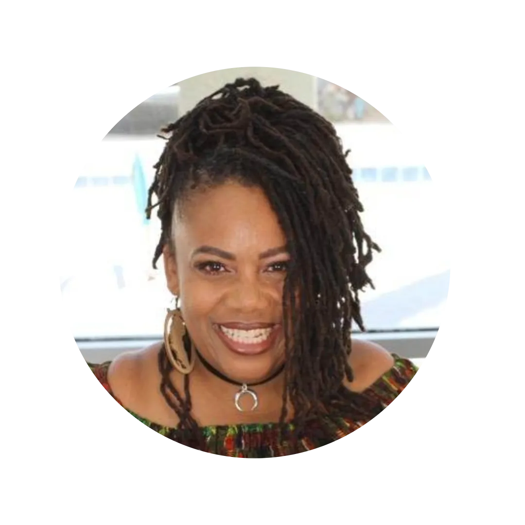 Raminyah Ingram, founder of Wombniversity, smiling portrait representing leadership, accountability, and supportive guidance.