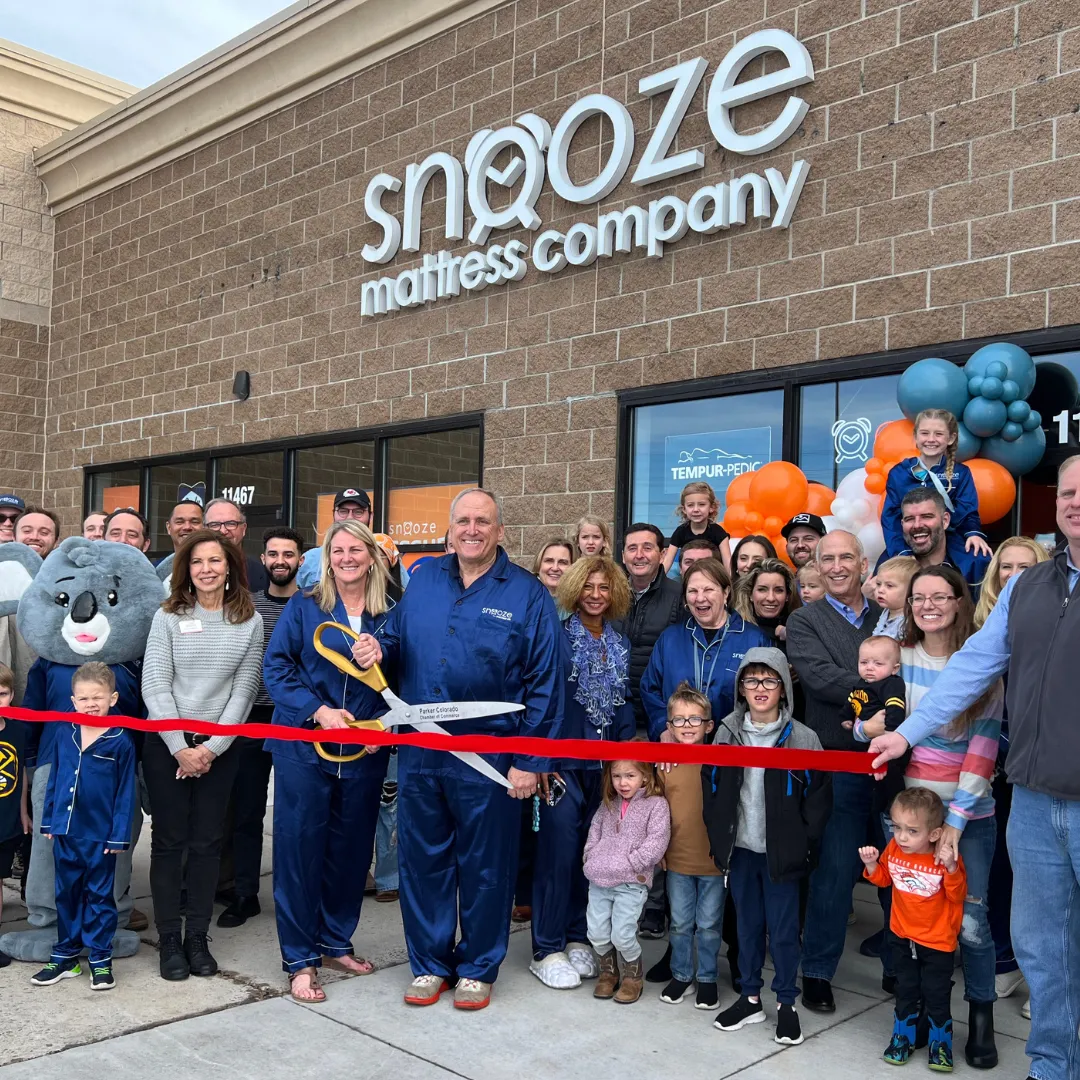 The Snooze Crew outside Snooze Mattress Company in Castle Rock, Colorado