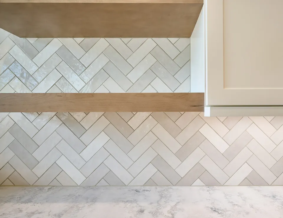 Modern staircase and hardwood floor installation as part of complete interior home renovation for improved style function and comfort