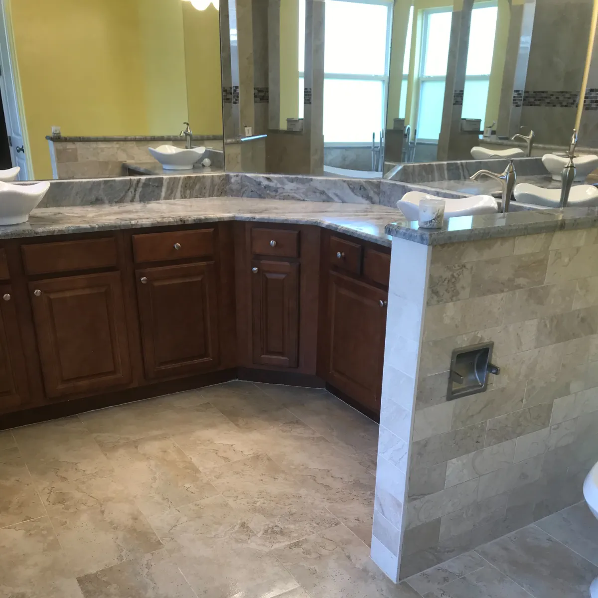 Newly built two-story suburban home with attached garage and fresh sod landscaping.