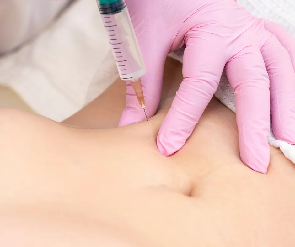 woman sitting on white bed while stretching