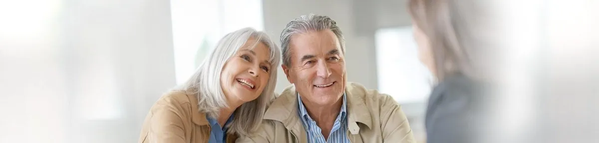 brown leather bifold wallet on white surface