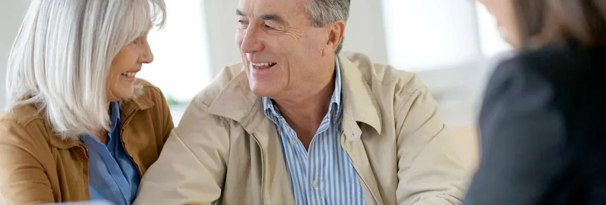 brown leather bifold wallet on white surface