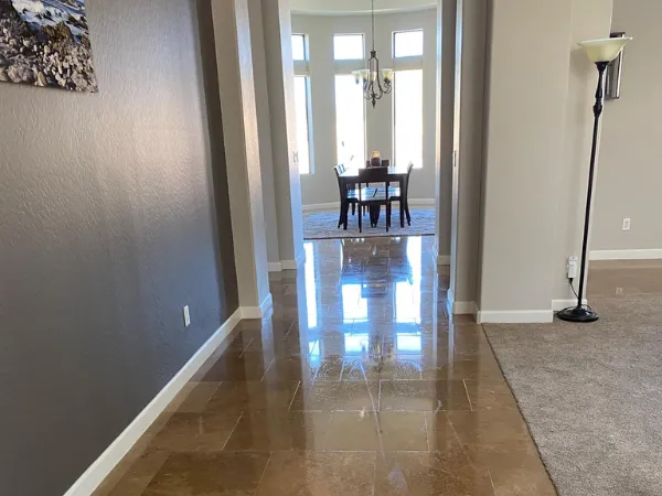 Clean and polished tile floor in Phoenix home after professional tile and grout cleaning service
