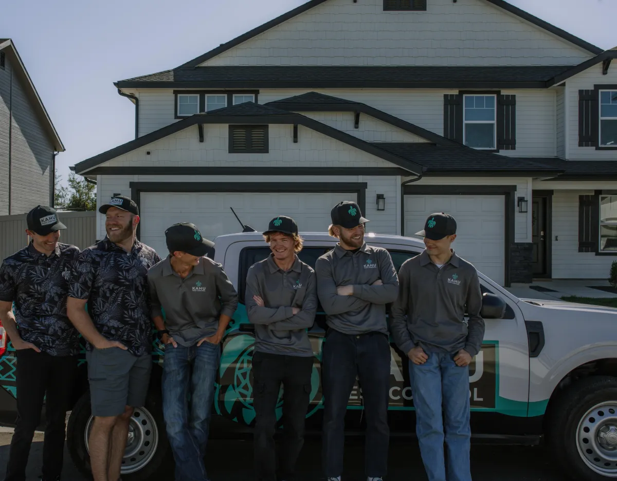 A young professional, Jordan, standing confidently in front of a whiteboard filled with sales charts, smiling and holding a 'Top Performer' award. The office is modern, with plants and motivational posters.