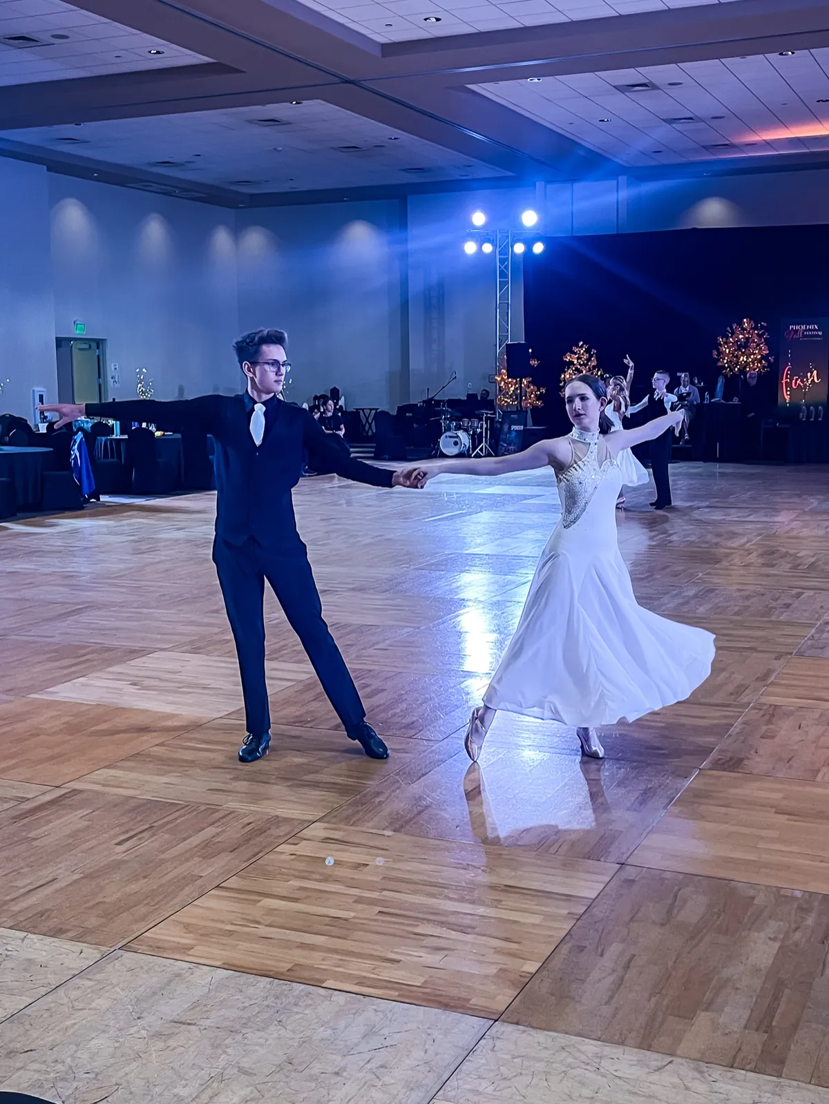 Phoenix Ballroom Academy students performing a Smooth dance at a ballroom competition