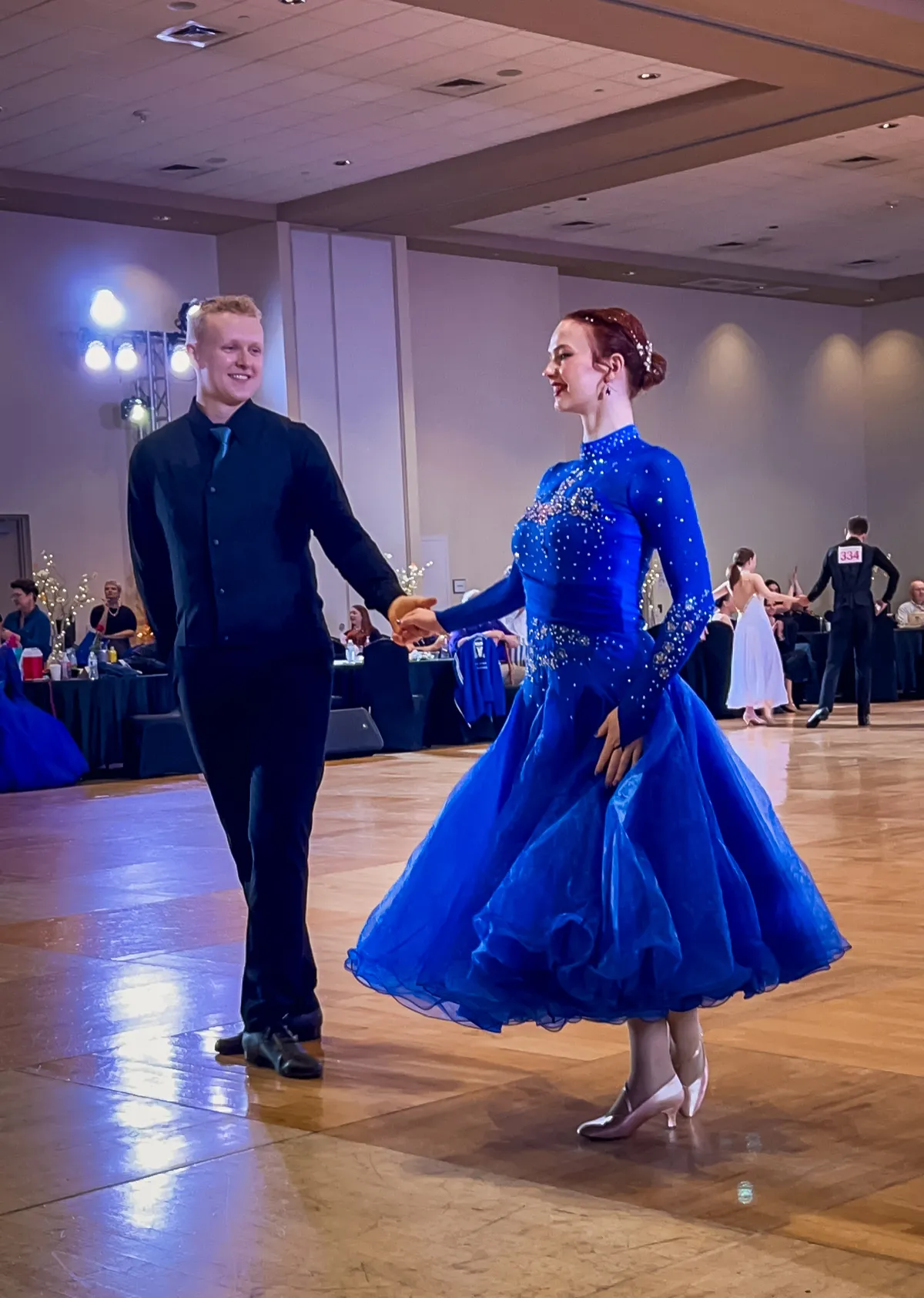 Phoenix Ballroom Academy students together at a ballroom dance competition