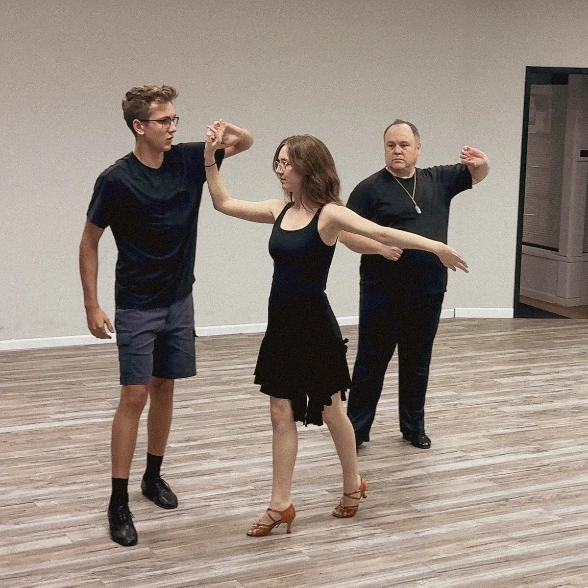 Youth students learning Latin ballroom dancing at The Phoenix Ballroom Academy in Chandler, Arizona