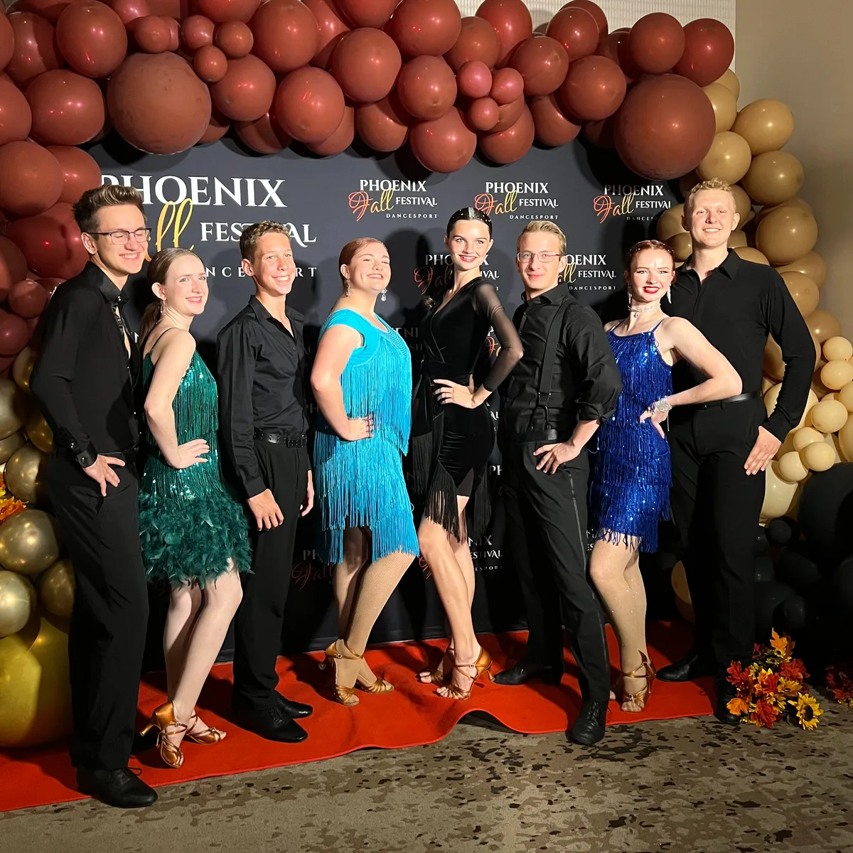Youth ballroom students together at a dance competition