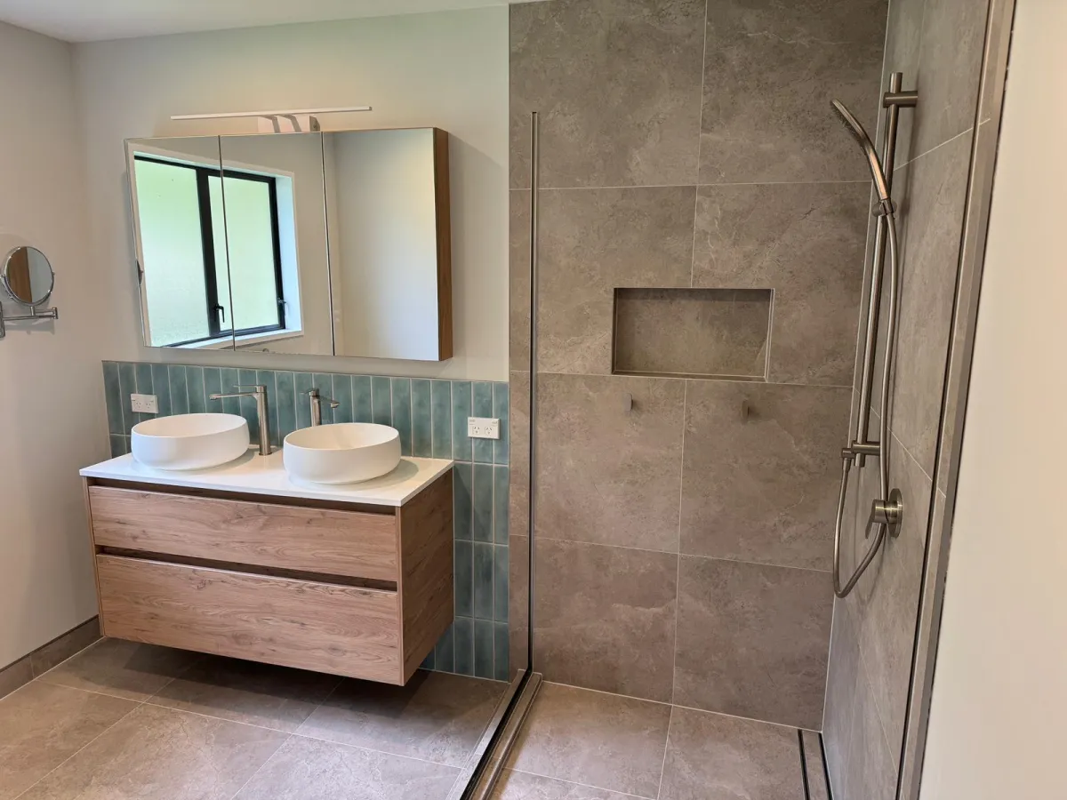 Finished wet area bathroom with tiled shower niche and waterproofed walls by Remarkable Contracting in Hawke's Bay