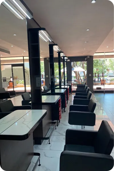 Consultation area with armchair and soft lamp light for private conversations.