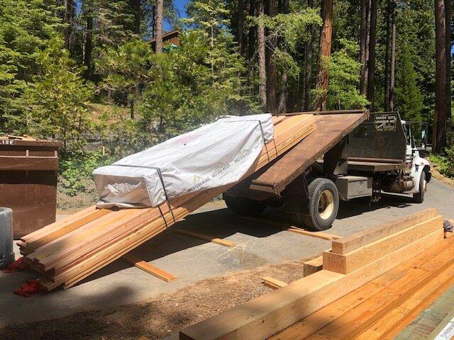 a pile of cut logs sitting next to each other