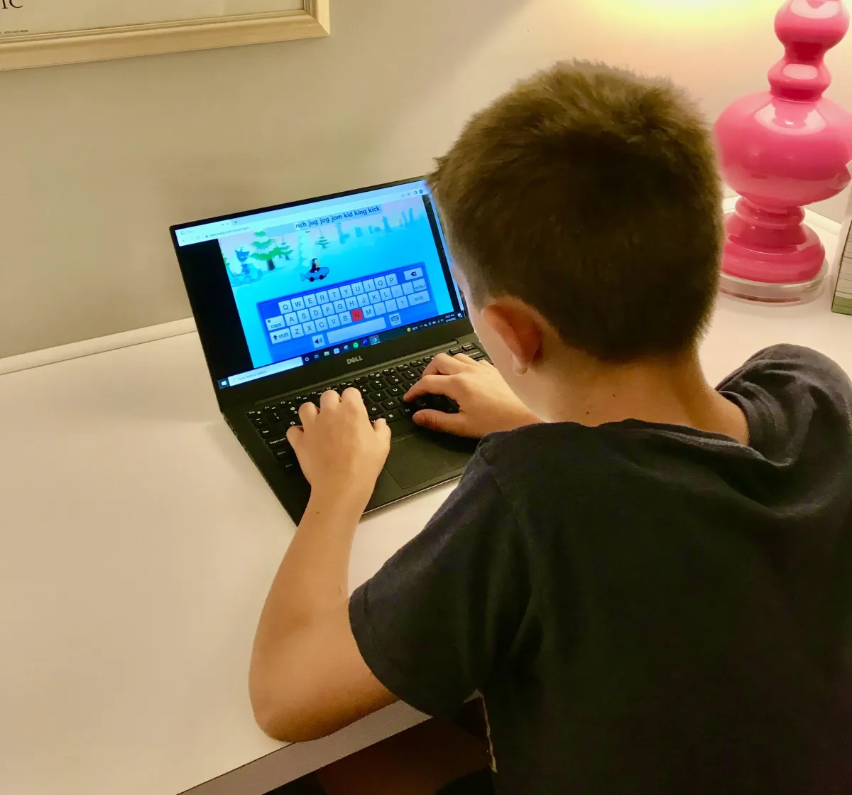 Child with Dysgraphia using a keyboarding program to learn to touch type.