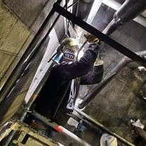 JI Industries - Welder welding on a structure