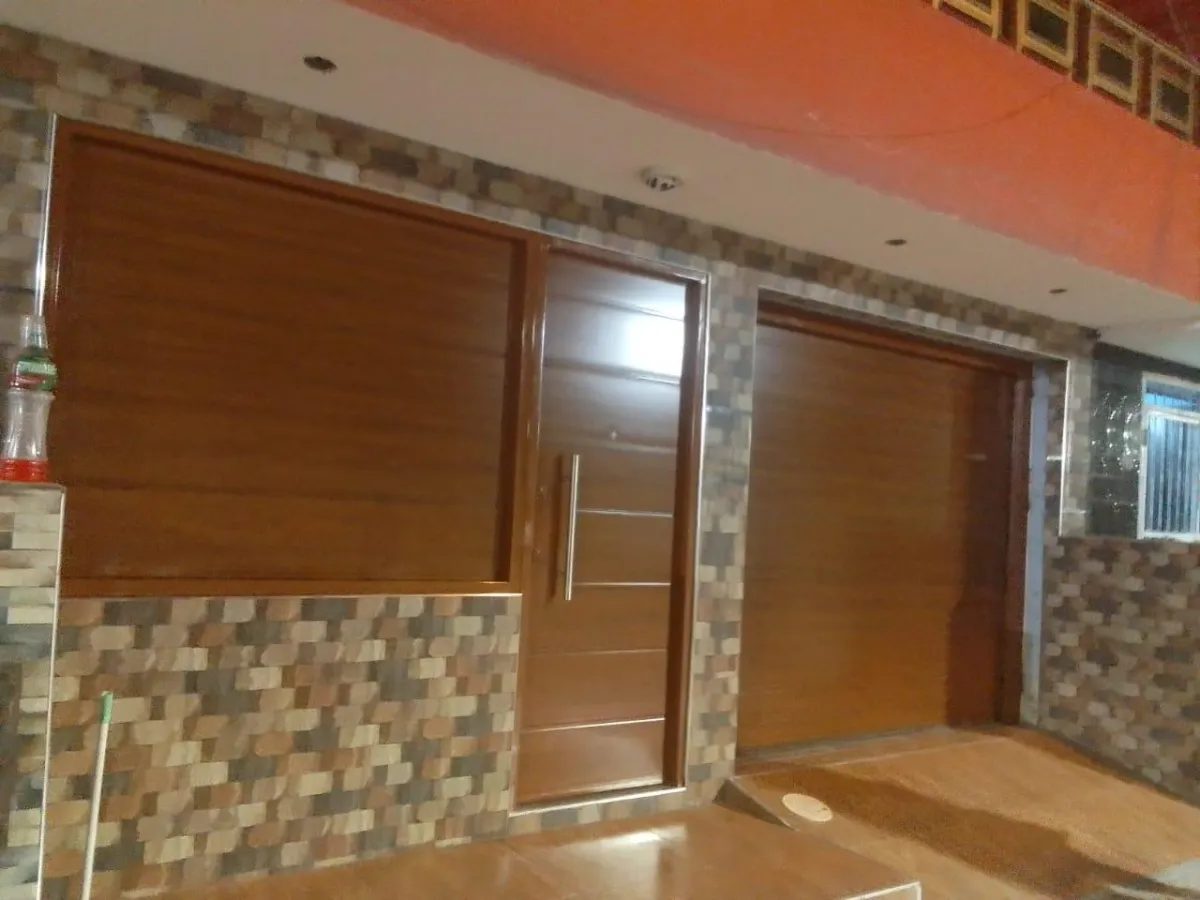 closed white wooden house garage door