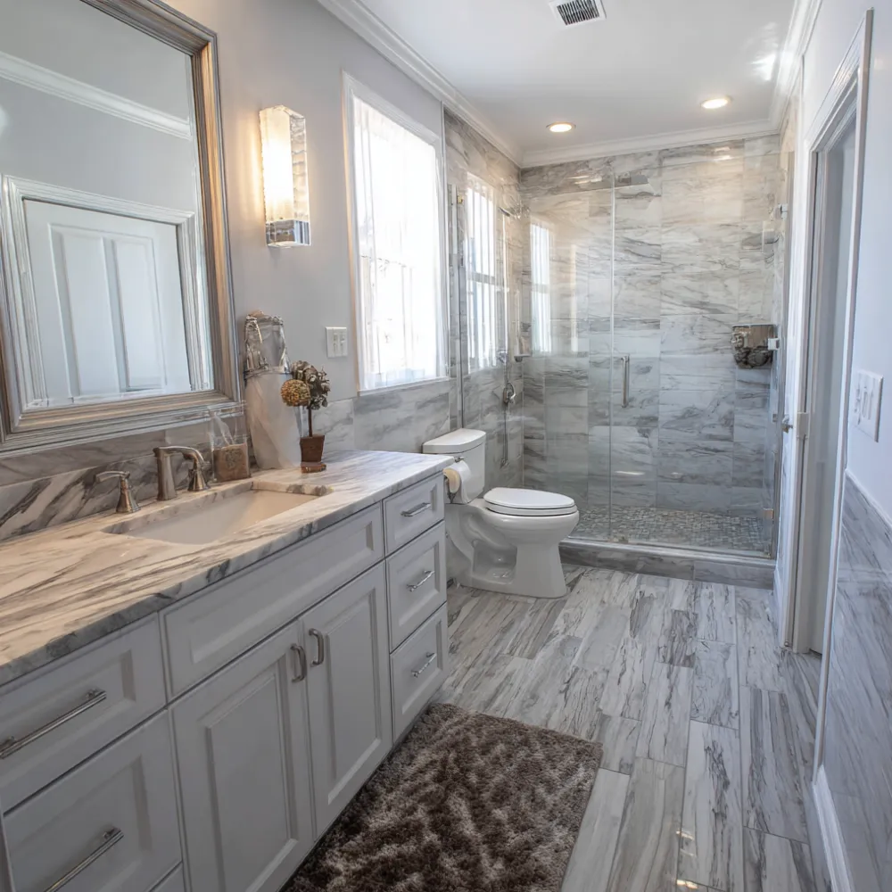 Modern bathroom remodel with walk-in shower and double vanity