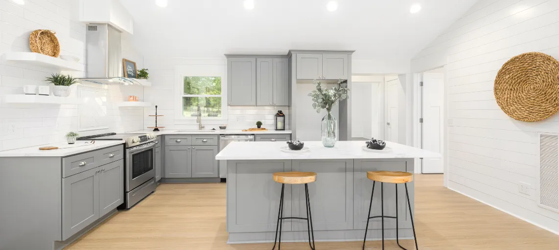 Modern kitchen remodel featuring custom cabinetry, high-end countertops, and premium appliances for a stylish and functional space.