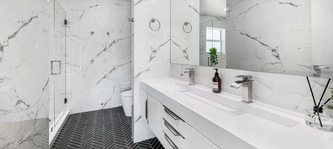 Modern kitchen remodel featuring custom cabinetry, high-end countertops, and premium appliances for a stylish and functional space.