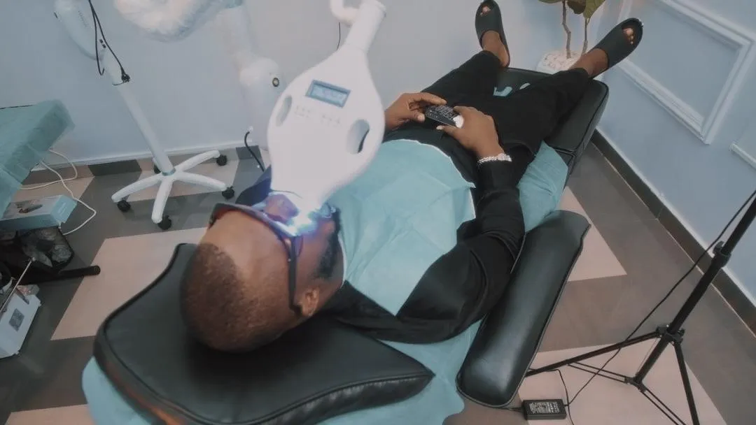 a man receiving teeth whitening at VIIP Dental SPA