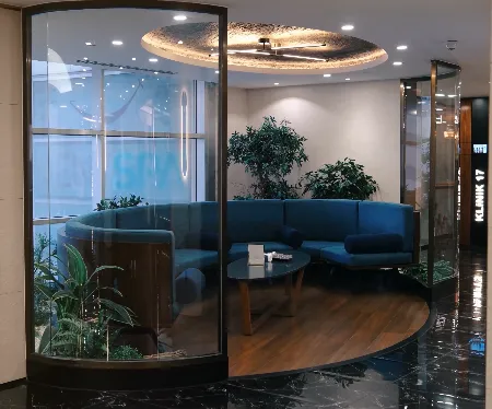 stainless steel faucet on white ceramic sink