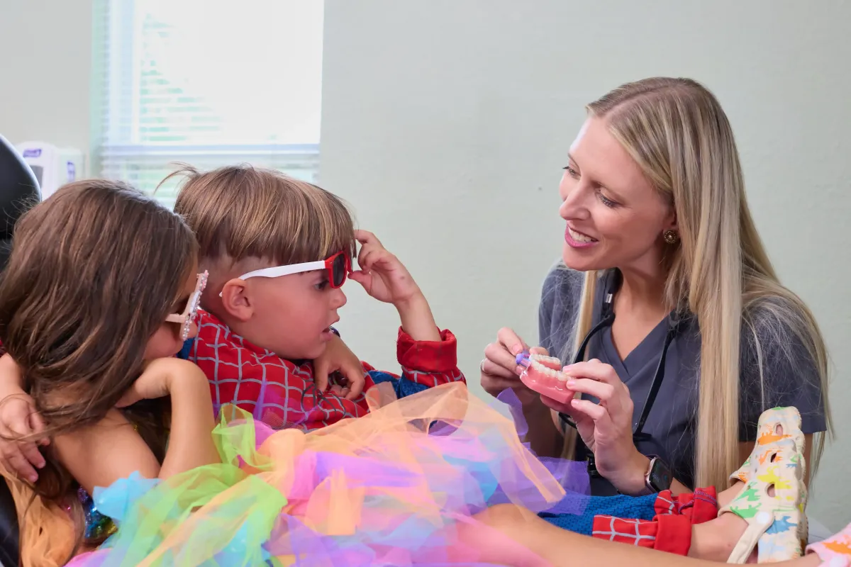 Dr. Cyndi Blalock providing gentle pediatric dental care to a young patient in St. Peters MO