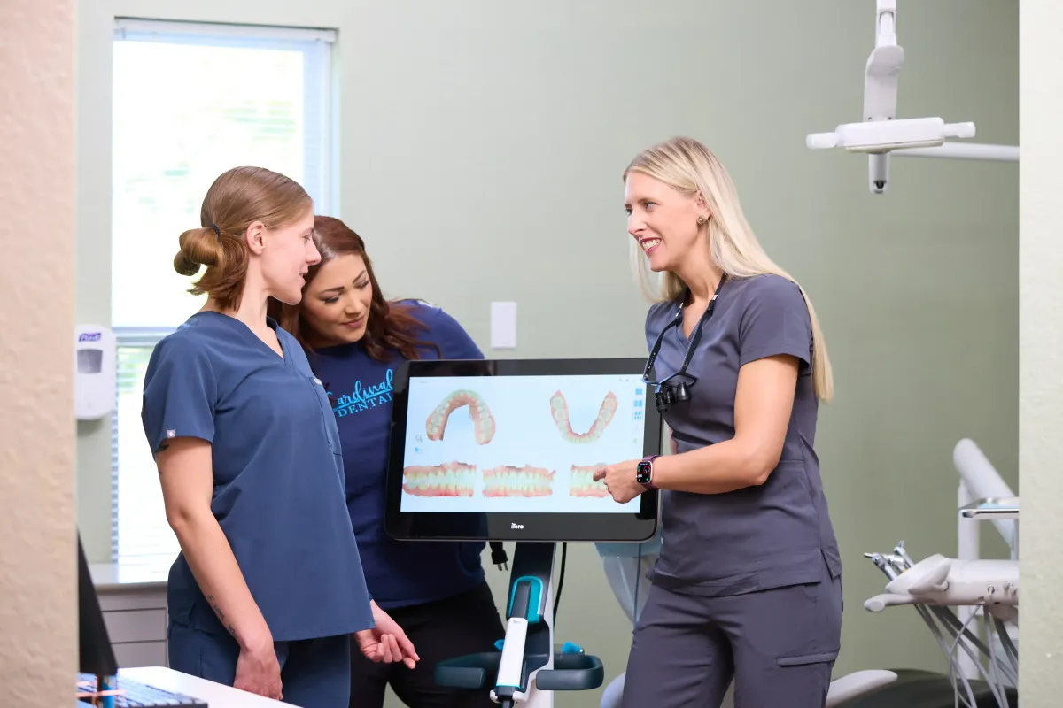 Dr. Cyndi and her team using digital scanning technology to plan a precise and comfortable treatment