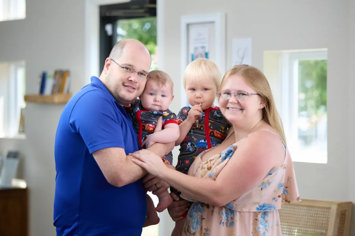 A local St. Peters family visiting Cardinal Dental for their children's dental appointment in a calm, patient-centered environment