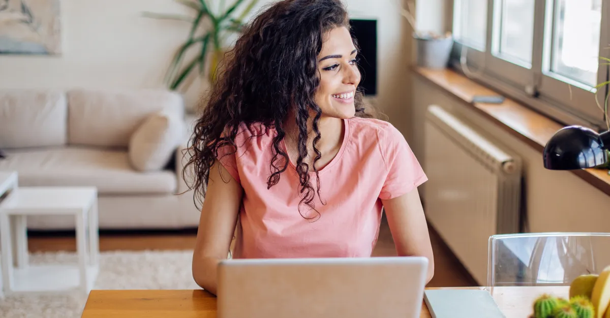 woman looking away while working on laptop feeling fatigued despite normal lab results