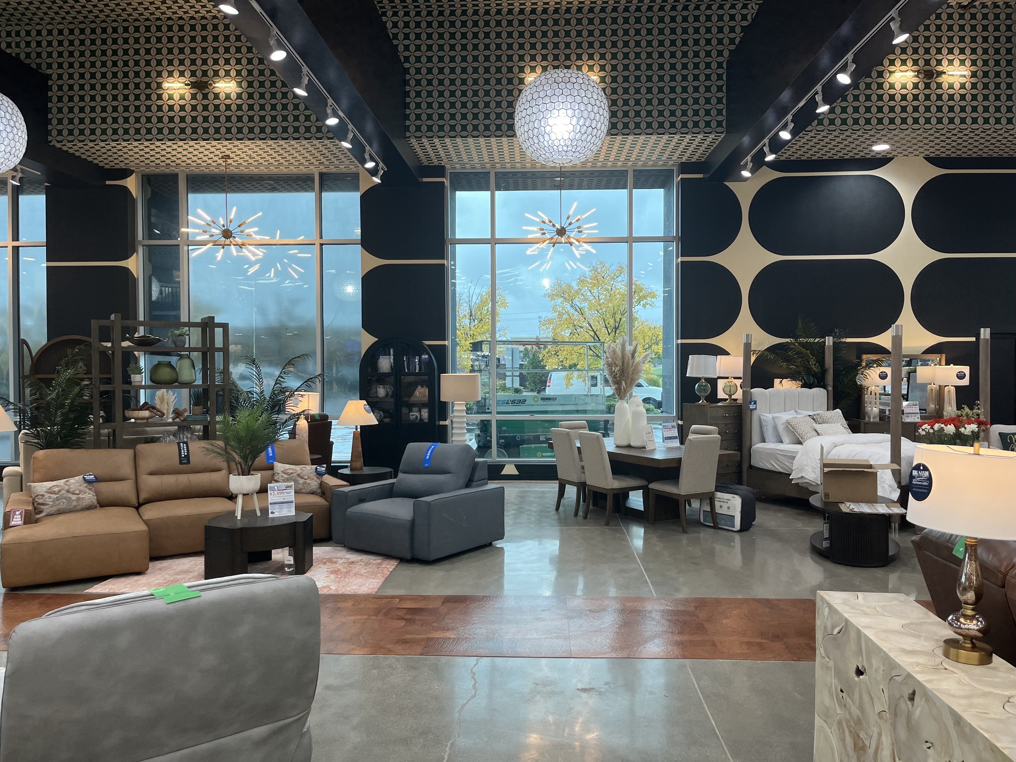 Interior of the American History Rotunda in the Buffalo Pacific prototype, featuring an enlarged $50 US Gold Coin emblem on the floor, a large American flag mural, and classical columns, representing the company’s dedication to honoring national history.
