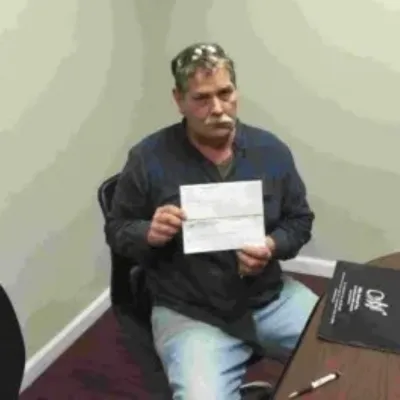edward holding closing check