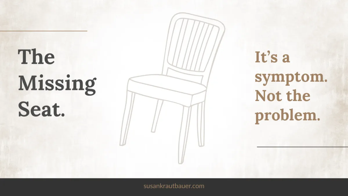 Illustration of an empty chair pulled back from a table, representing a fractional leader's missing seat in decision-making