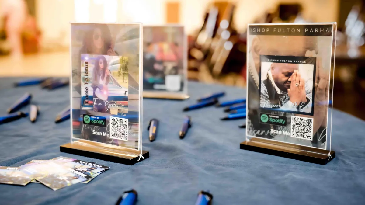 A man holding a microphone on stage