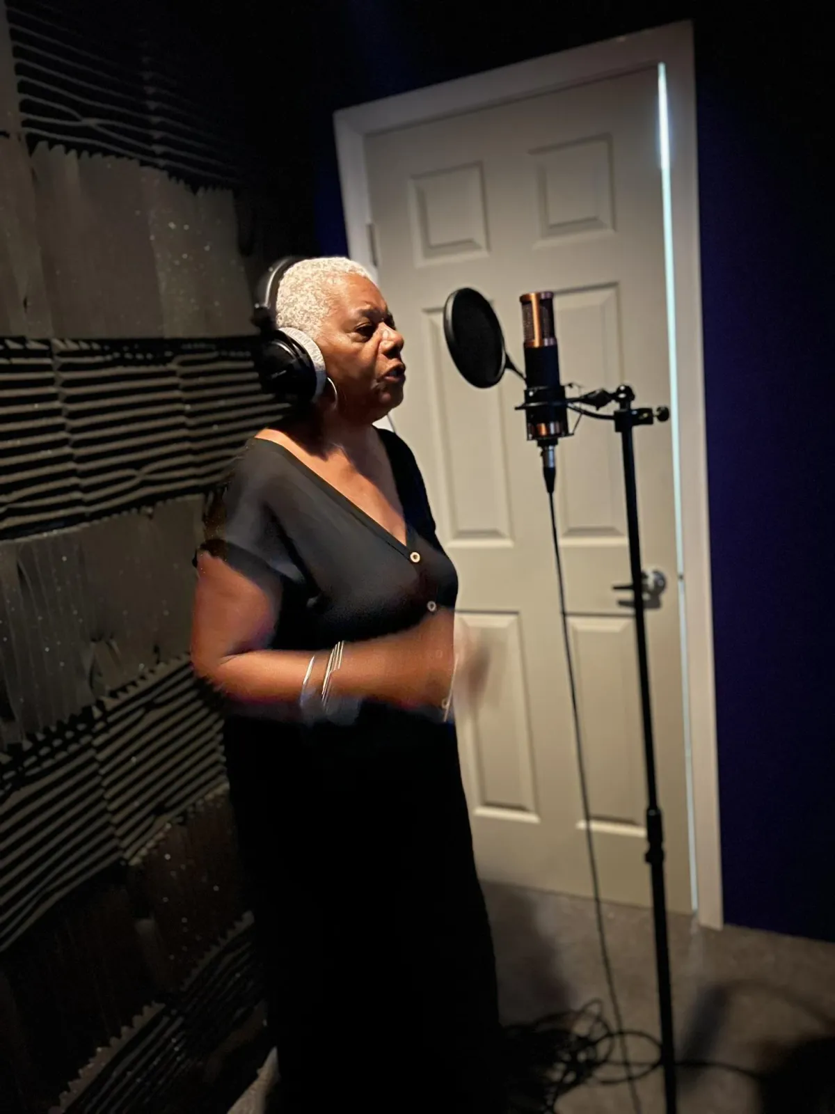 architectural photography of building with people in it during nighttime