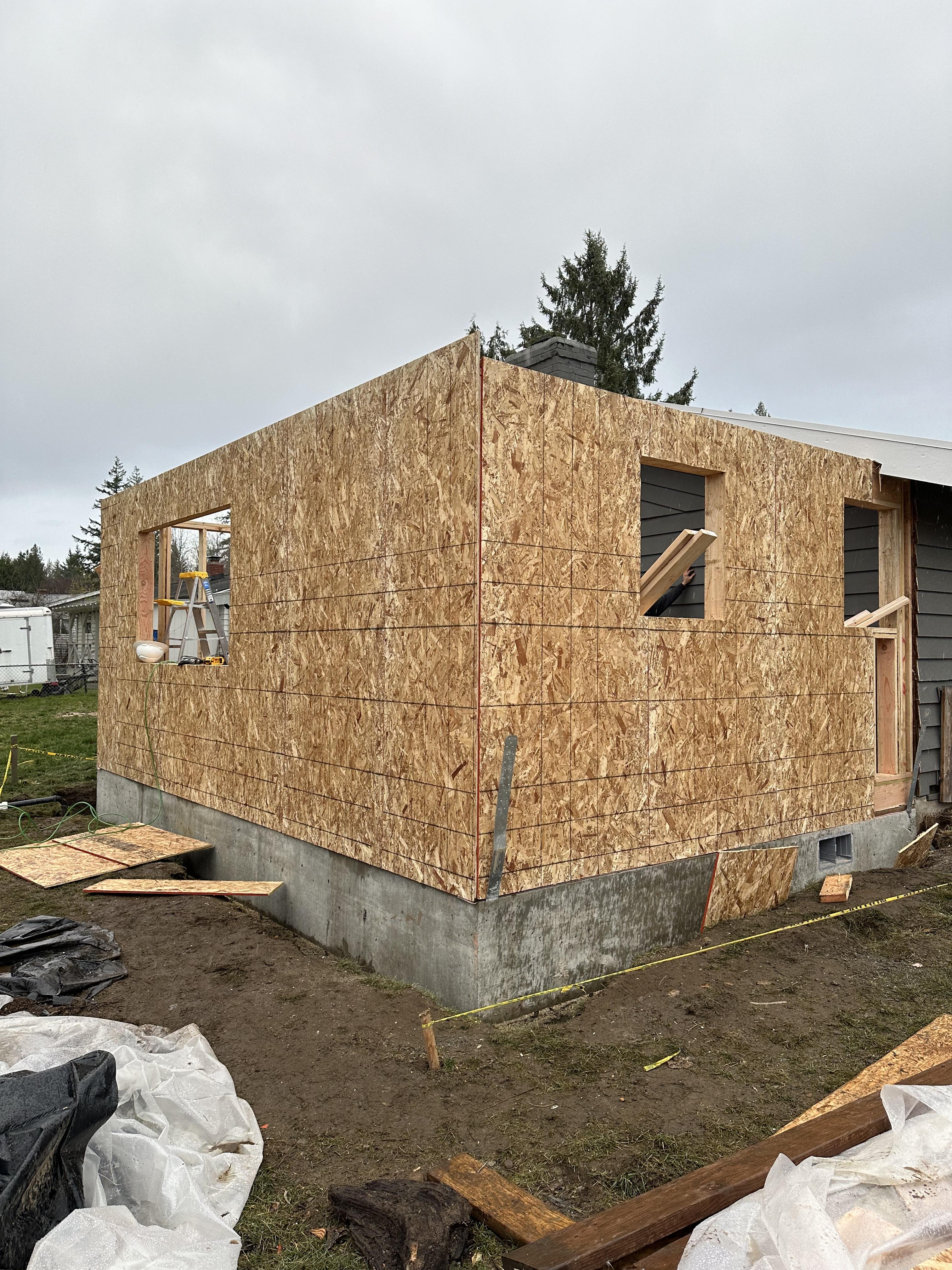 Framing stage of a home addition project