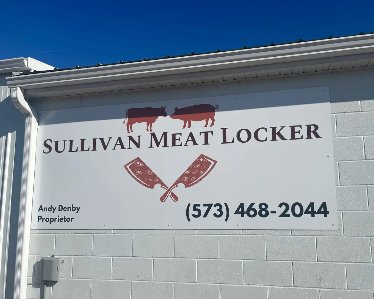 Exterior signage at Sullivan Meat Locker, a local butcher shop and custom meat processing business in Sullivan, Missouri.