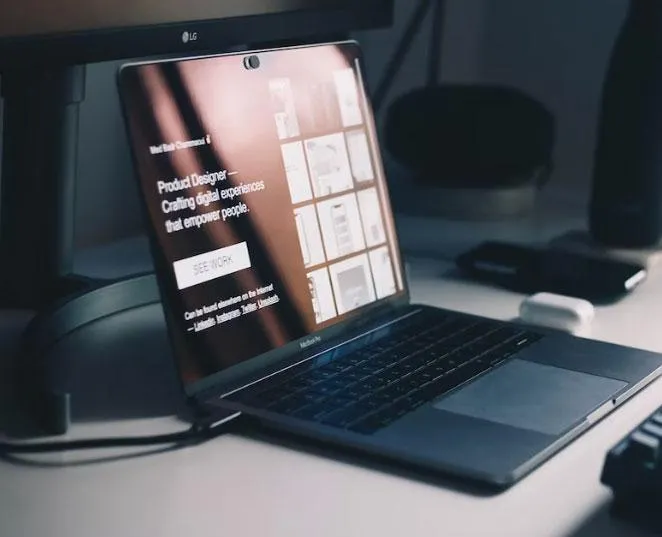 Image of a laptop opened on a des