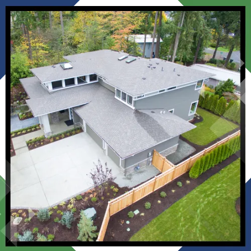 Roofing Company in Mount Vernon, WA checking a home roof 